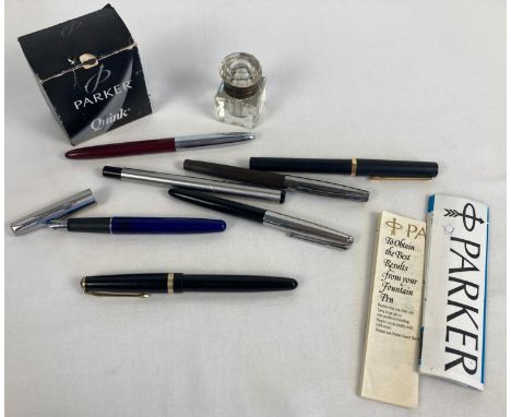A collection of vintage fountain pens, a small glass inkwell and Parker ink. To include Conway 57 with 14ct gold nib, Osmiroi