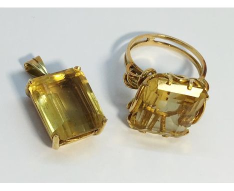 A Citrine ring set in 9ct gold, citrine ETW 9.5 cts. Ring size K, together with a Citrine Pendamt in 9ct, Citrine ETCW 7.5 ca