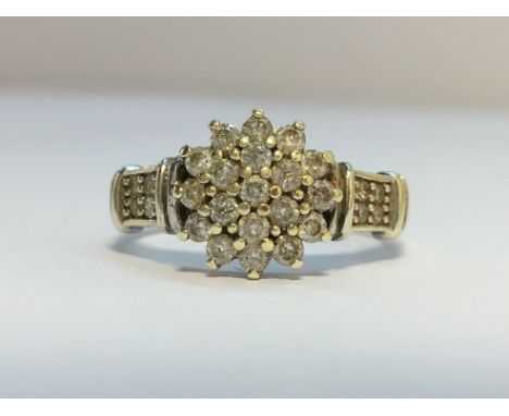 A Diamond Floral Cluster ring in 9ct white gold. Diamonds 0.50 ct stamped in band. Ring size K and a half, total weight 3.06 