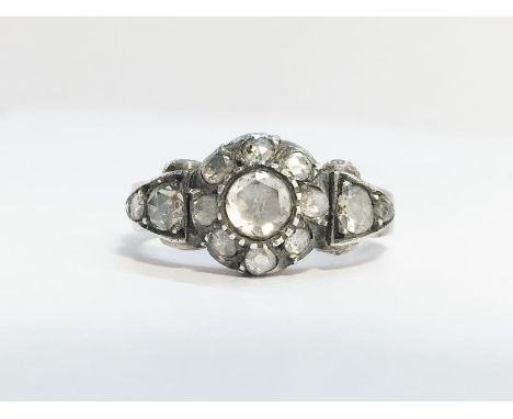 A Georgian Rose Cut Diamond Cluster Ring, silver set with 9ct rose gold shank (unmarked, tested).  2 rose cut diamonds to the