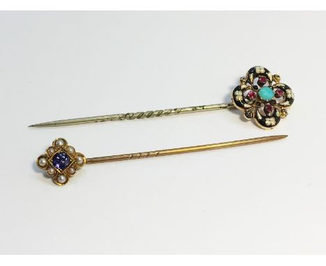 A pair of Victorian Stick Pins, including a stick pin with Turquoise, Garnet and Enamel set in 15ct gold, and an Amethyst and