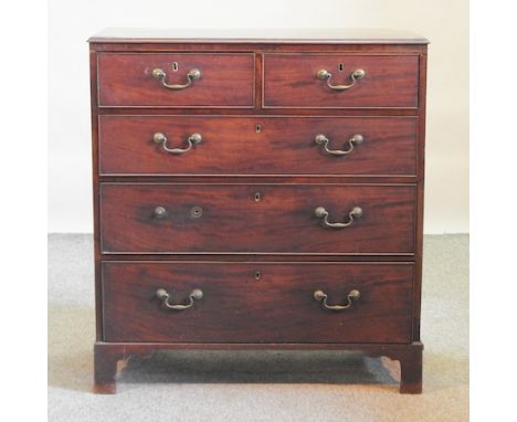 A George III mahogany chest, containing two short over three long drawers, on bracket feet, 92cm