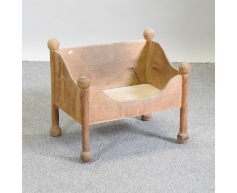 A hand made light oak dog basket, 64cm