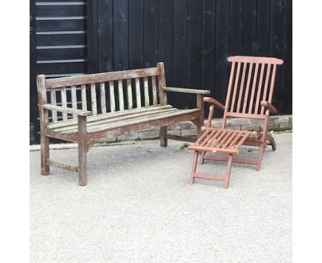 A wooden garden bench, 160cm, together with a teak garden armchair