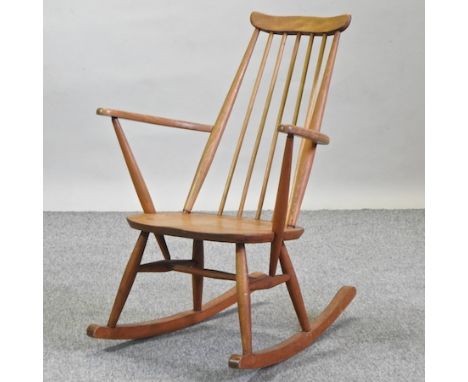An Ercol light elm rocking chair