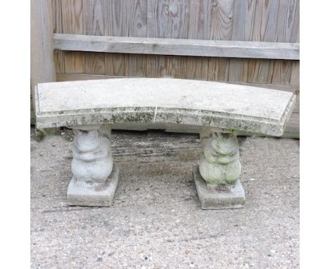 A reconstituted stone garden bench, standing on squirrel supports, 106cm, together with a collection of terracotta garden pot