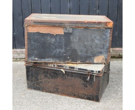 A vintage black painted trunk, 91cm, together with another