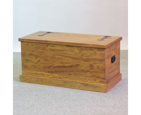 A hardwood trunk, with a hinged lid, 92cm