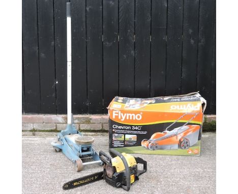 A petrol chainsaw, 81cm, together with a trolley jack and a Flymo lawnmower