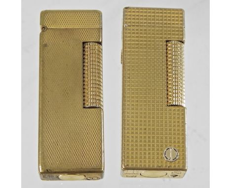A Dunhill pocket lighter, together with another