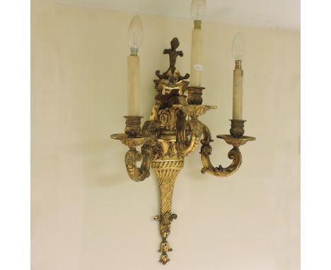 A 19th century gilt gesso three branch wall light, 63cm high