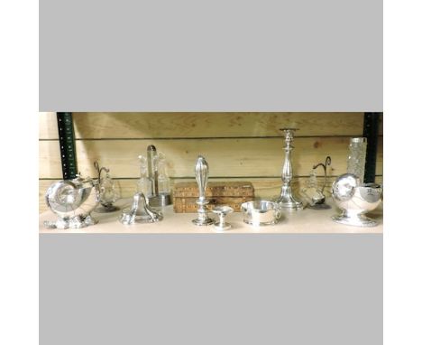 A continental silver table candlestick, together with a collection of silver and plated items, to include spoon warmers, toge