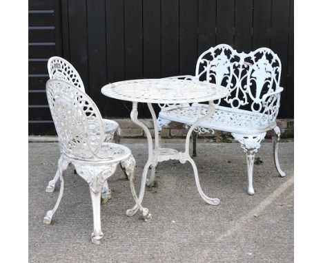 A white painted circular garden table, 76cm, together with a bench and two chairs