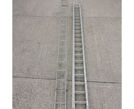 A large aluminium extending ladder, 550cm, together with a hook ladder