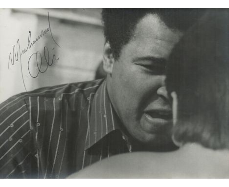Muhammad Ali signed 10x7 inch vintage black and white photo. Good condition. All autographs are genuine hand signed and come 