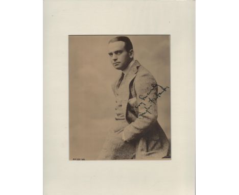 Douglas Fairbanks signed 14x11 overall mounted black and white vintage photo. Good condition. All autographs are genuine hand