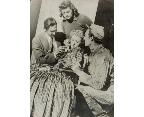 Joan Bennett Signed 9 x 7 inch Vintage Black and White Photo. Signed in blue ink. Showing Signs of age. Good condition. All a