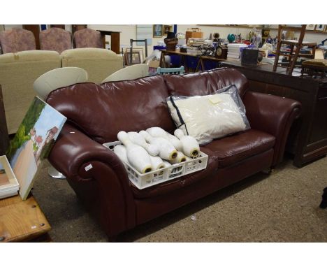 A Laura Ashley three seater leather sofa