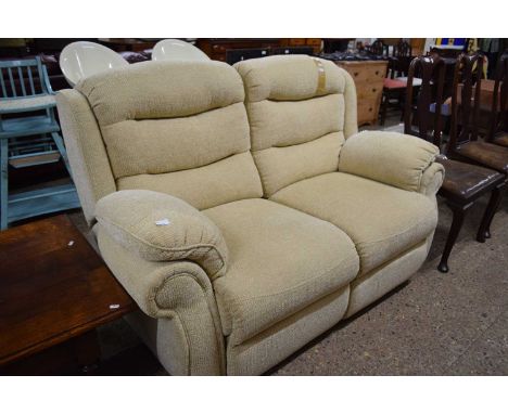 An oatmeal two seater recliner sofa