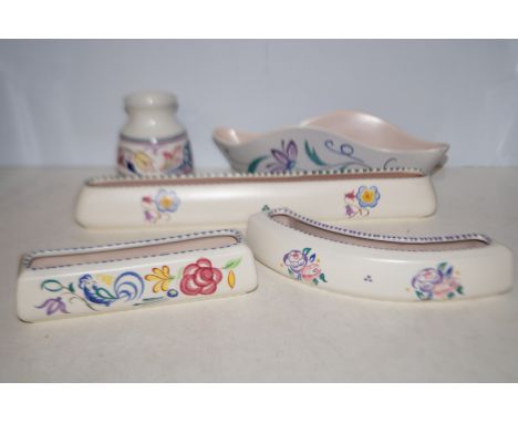 4 Poole pottery flower troughs together with a vase