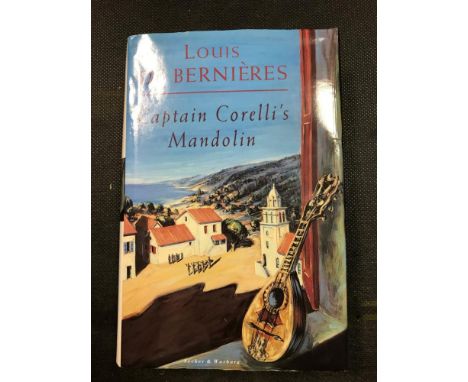 BERNIERS (Louis de) Captain Corelli's Mandolin. London: Secker & Warburg, 1994, first edition, 8th impression, signed by the 