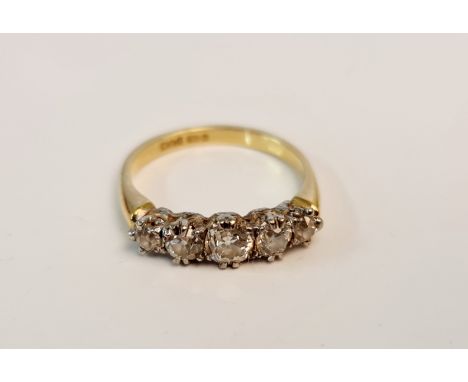 A hallmarked 18ct yellow gold five stone diamond ring, set with five graduated old cut diamonds, total diamond weight approx.