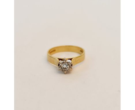 An 18ct gold solitaire diamond ring. Weight 3.9grams