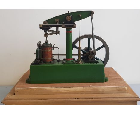 A Stuart Turner beam live steam engine in case.