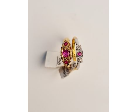 A hallmarked 18ct yellow gold three stone ruby ring, ring size P, and a hallmarked 18ct yellow gold and platinum ruby and dia