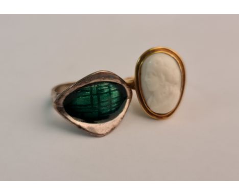 A Scandinavian style enamel ring, ring size D½, along with a cameo ring, ring size G½.
