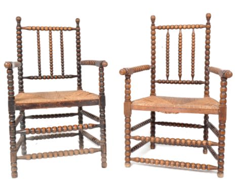 A pair of ladies &amp; gents 19th Century Arts &amp; Crafts bobbin turned armchairs having turned bobbin gallery backrest, ar