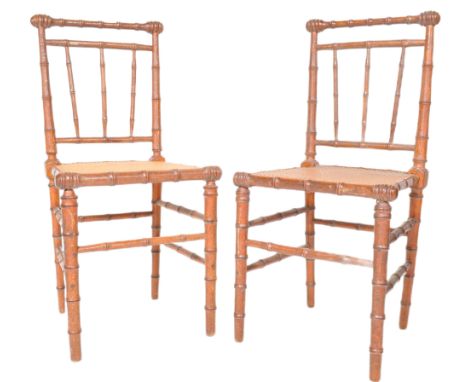 A pair of 18th Century style faux bamboo chairs having simulating bamboo wood frames with cane seat rests raised on tapering 