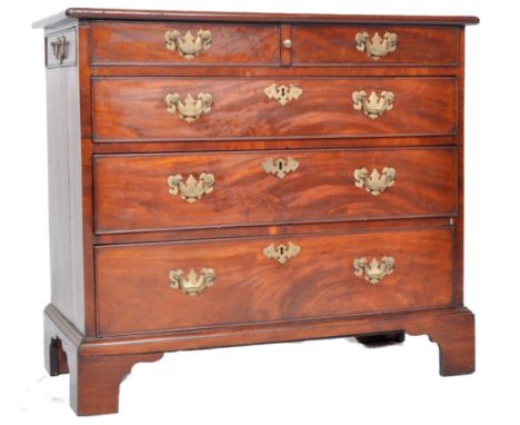 An 18th Century George III walnut bachelors chest of drawers. The bank of two over three drawers having pull out writing sect