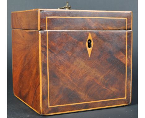 An 18th Century George III mahogany single tea caddy of square cube form. The caddy having tulip wood / satinwood inlay and d