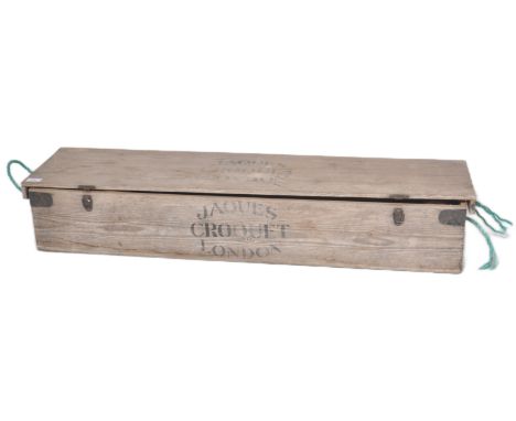 An original vintage early 20th century Croquet set by Jaques of London. The set appearing complete in original wooden box wit