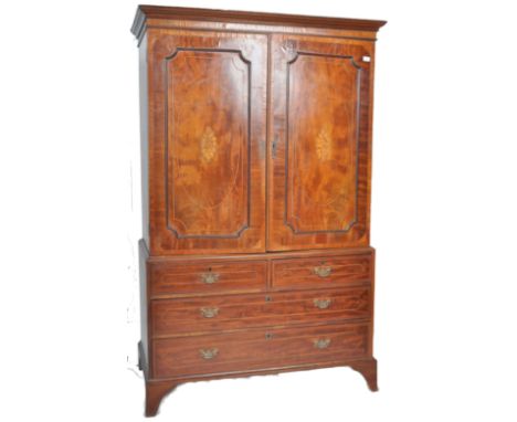 An 18th Century mahogany &amp; satinwood inlaid linen press housekeepers cupboard. Stepped pediment top with twin doors decor