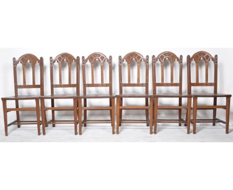 A set of six 19th Century Victorian Arts &amp; Crafts Gothic oak dining chairs in the manner of EW Pugin. The back formed fro