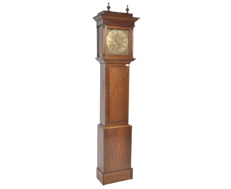 An 18th Century George III oak cased longcase grandfather clock by John Chance of Chepstow. Brass dial with engraved detailin