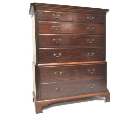A late 18th Century George III mahogany chest on chest having a flared cornice with two short drawers over three long to the 