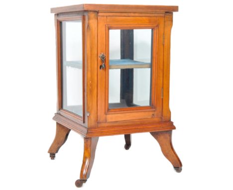 A 19th Century French walnut Bijouterie jewellery display cabinet of square form having an oversized square top with shaped c