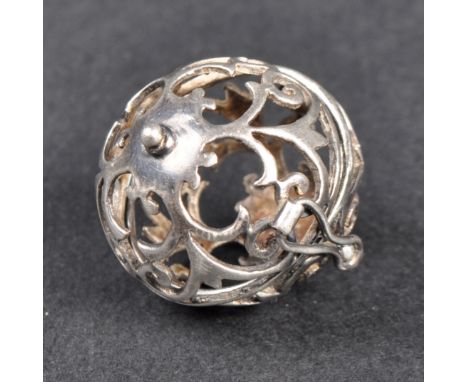 A collection of 19th Century silver &amp; semi precious stone objects comprising a fret pieced ball / orb, faceted green agat