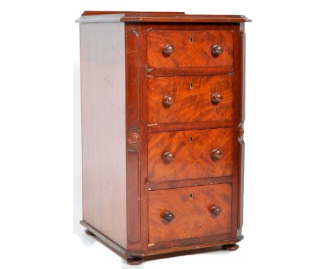 A 19th Century Victorian mahogany pedestal chest of drawers. The straight bank of drawers having turned pull handles all rais