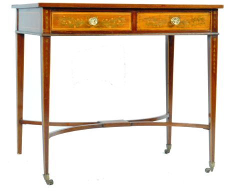 An Edwardian inlaid mahogany side table / writing table desk of simple form having decorative inlaid floral decoration to the