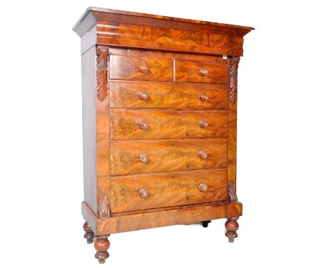 An early 19th Century Regency period Scottish mahogany chest of drawers. The bank of two over four drawers having a secret hi