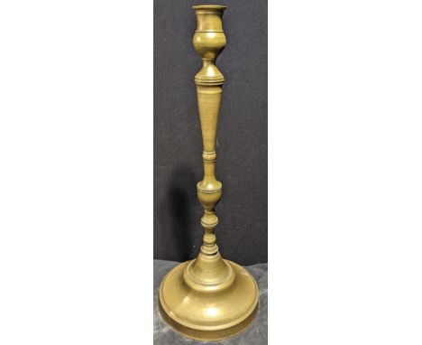 A Turkish brass candlestick, converted to electric, H.60.5cm