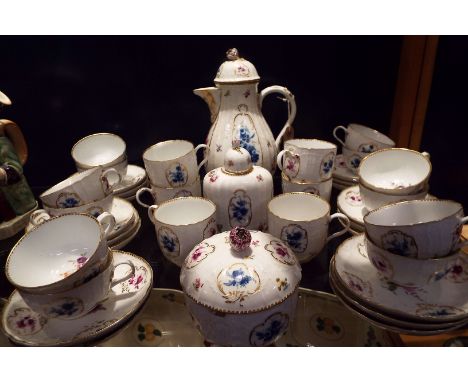 A late 18thC Meissen dot period porcelain coffee service each piece decorated with hand-painted floral sprays within gilt car