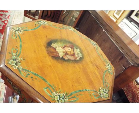 An Edwardian satinwood octagonal side table having hand-painted central portrait of a female, the border with flowers and rib