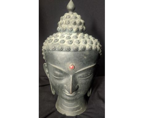 A bronze Buddha head, H.39cm