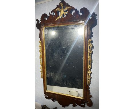 A Georgian mahogany fretwork cut wall mirror H.93.5cm W.46cm
