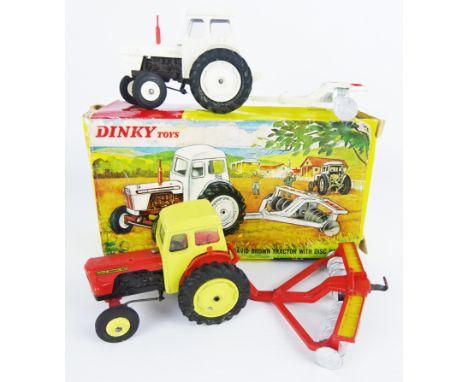 Dinky Toys die-cast model 325 David Brown Tractor with Disc Harrow, white body & red exhaust, boxed, another with red body an